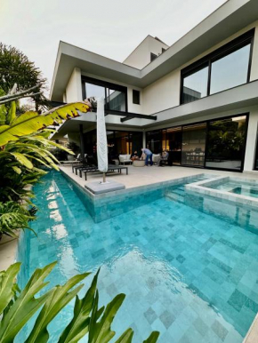 Jurerê Beach Villa - piscina jacuzzi sauna